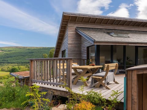 Cloud, Sky, Plant, Property, Wood, Building, Flower, Table, Outdoor Furniture, Land Lot