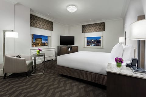 Sip something cozy as city lights sparkle beyond your window.