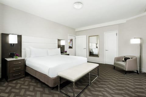 Recharge in crisp linens and soft lighting for deeper sleep.