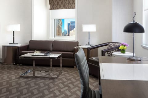 Work comfortably by the window, then unwind on the sofa.