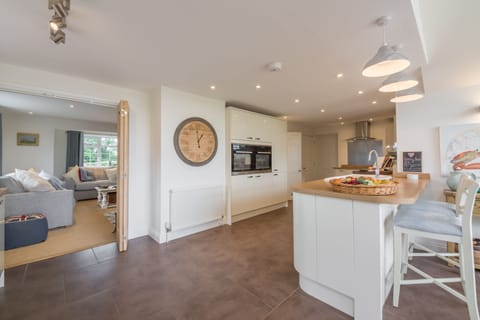 Ground floor: Kitchen with view to sitting room