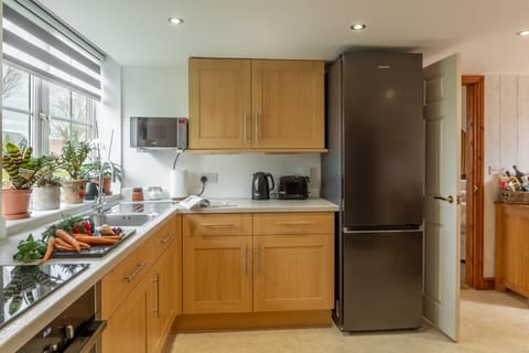 Ground floor:  Kitchen and dining area with french doors to garden