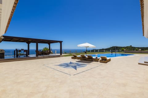 Pool area with sea views