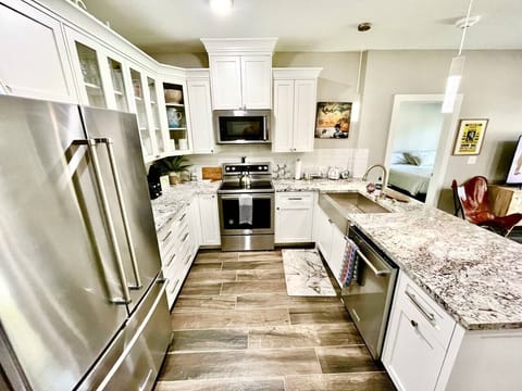 Unit 101 Fully stocked gourmet kitchen with Clint Eastwood making sure!