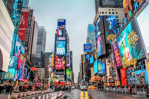 Step outside into bright city energy, dining, and nightlife nearby.