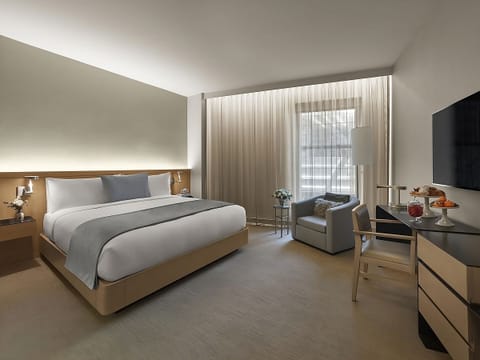 Wake up in a bright, airy room with lounge seating.
