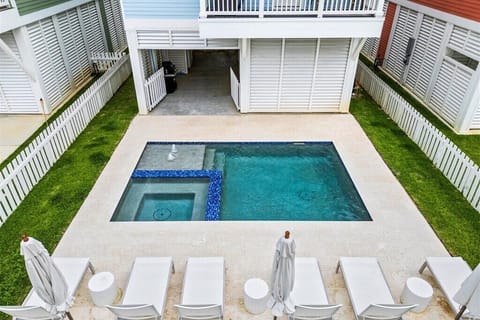 Dive into relaxation with stunning views and comfy lounge chairs!