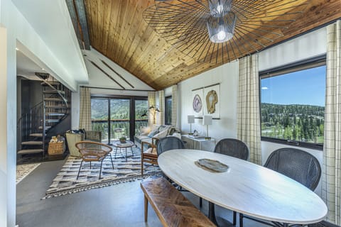 Living room - Main living space with mountain views, deck and Queen pullout sofa bed.