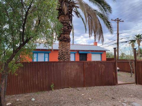 Fully Fenced In front yard with gates, fire pit