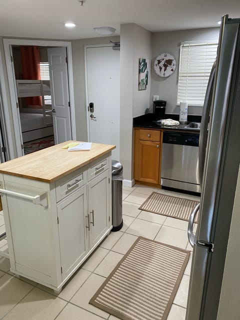 Island with storage and butcher block top. 