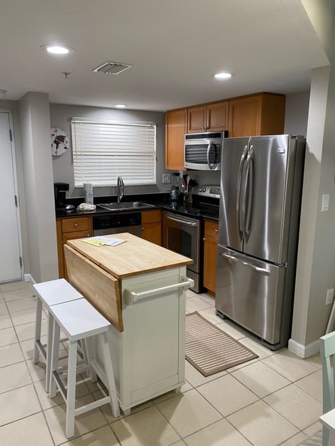Full Kitchen with Stainless Steel appliances. Fully stocked 