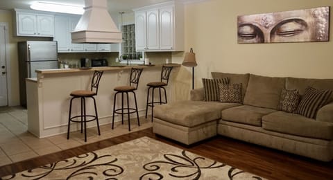 Open floor plan Living Room w/ Spacious Kitchen