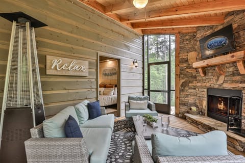 Outdoor wood burning fireplace with 50`` Flat screen TV Heat lamp is not included for guest use