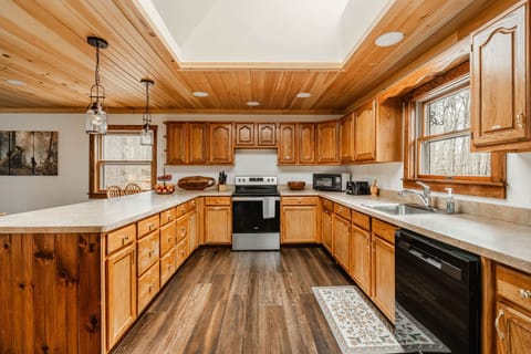 Kitchen includes full stove, fridge, dishwasher, microwave, toaster, etc.