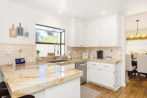 There is a Keurig in the home. You will also find the dining room right off the kitchen - perfect for family meals.