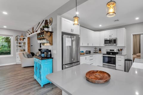 Open-concept kitchen and living space ideal for gathering and entertaining.