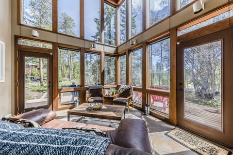 Living room - Gorgeous Atrium with beautiful and peaceful views located on the lower level