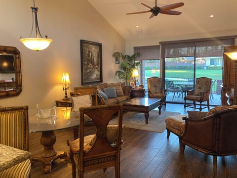 Living and dining area furnished with Tommy Bahama by Lexington