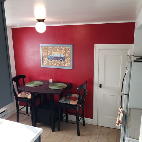 Dining table and pantry door.