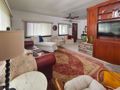 Large living room accommodates a group of friends or family