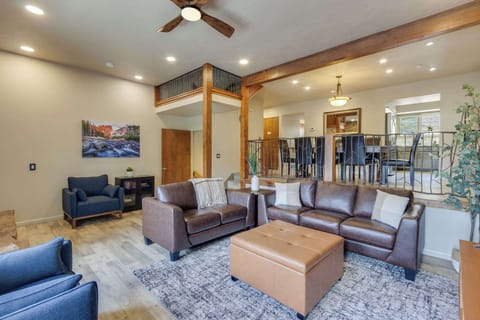 Spacious living room with plentiful seating space.