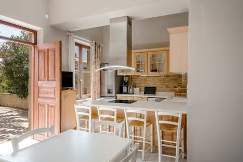 The kitchen offers direct outdoor access.