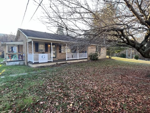 Front and side porches with seating.