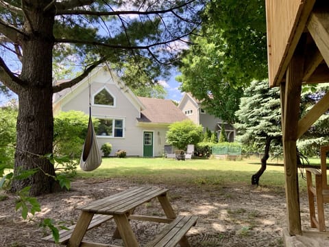 Looking back at the house from the sandbox