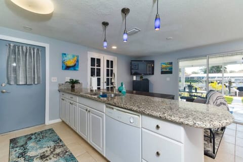 Kitchen with View To Backyard Waterway