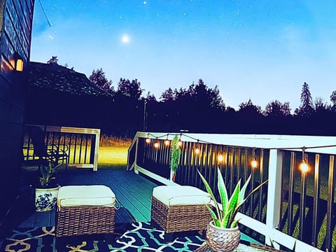 Enjoy a spacious back deck and yard to relax with coffee or watch the sunset.