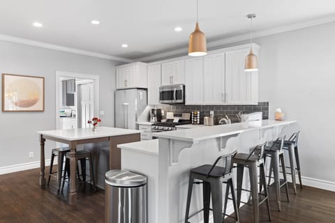 Kitchen- Through the door is the laundry room, back porch, hot tub and more.