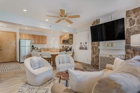 Living room with wood-burning fireplace
