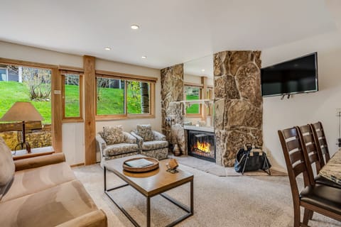 Living room with wood-burning fireplace