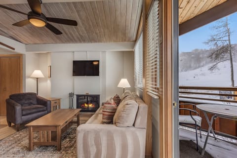 Top-floor studio with private mountain-facing balcony