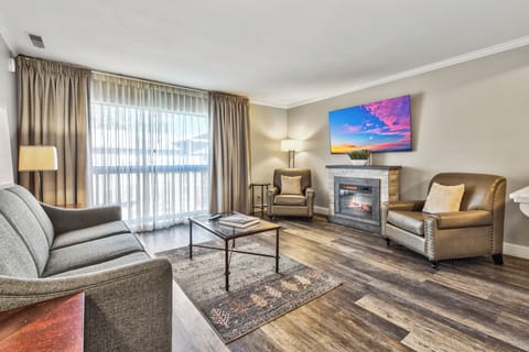 Living Area. Exact unit will be assigned upon arrival. Views, colors, and decor may vary.