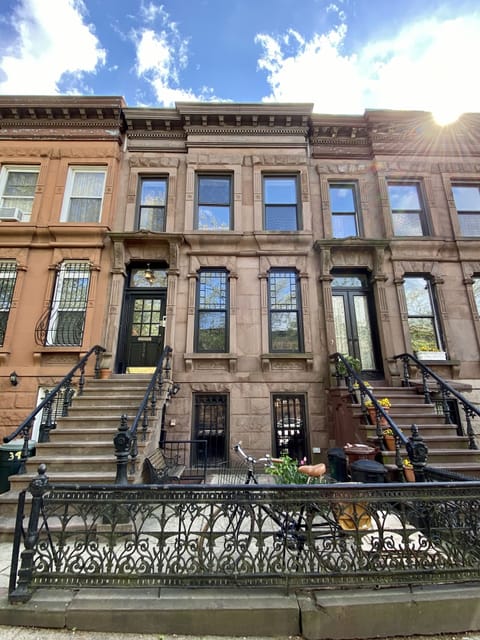 Historic brownstone of leafy block