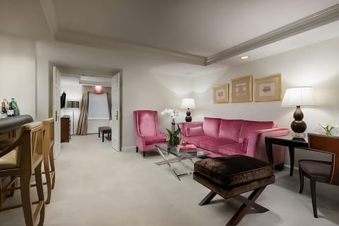 Sip a nightcap in a chic lounge with plush seating.