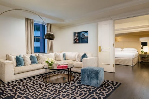 Stretch out on a cozy sectional steps from bed.