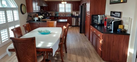Kitchen and dining area with coffee bar