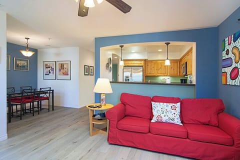 Kitchen opens up to living room and dining area