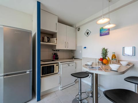 Furniture, Cabinetry, Countertop, Building, Kitchen Appliance, Kitchen, Interior Design, Kitchen Stove, Home Appliance, Table