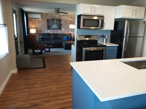 Kitchen partially open to family room