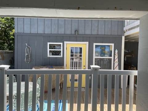 View of front of Cottage with privacy fence