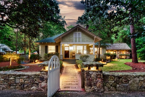 Discover the charm of Pinehurst at The Enchanted Escape, a beautifully restored historic estate set on a secluded 1-acre lot.