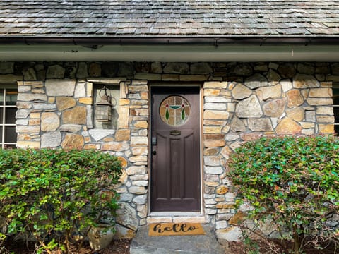 The Stone Pool House stained-glass window reflects the unique character of this home.