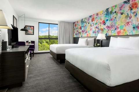 Stretch out in a bright room with art walls and views.