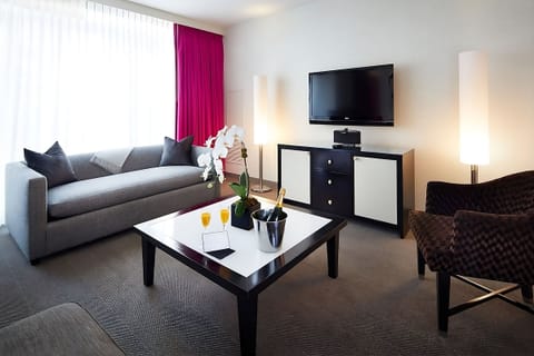 Sip a drink on the sofa in a calm, airy lounge.