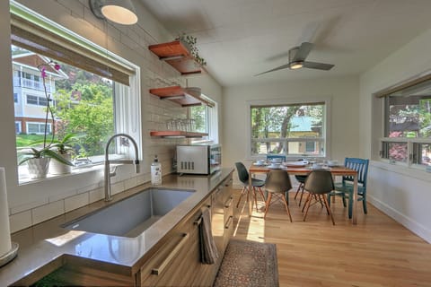 Newly remodeled kitchen with dining space overlooking garden