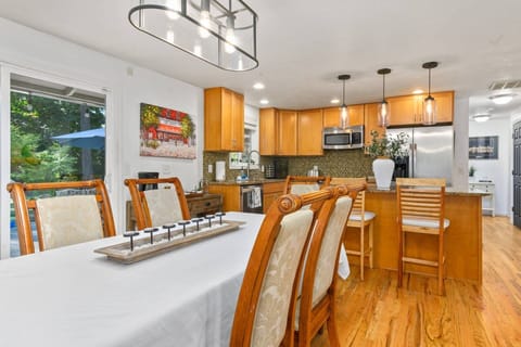 The dining area will fit 6 people comfortably and there is additional seating available at the island.