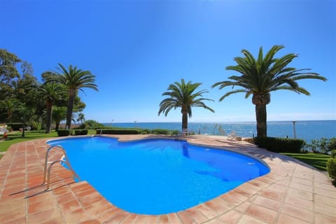 Fantastic communal pool with gardens and sea views
